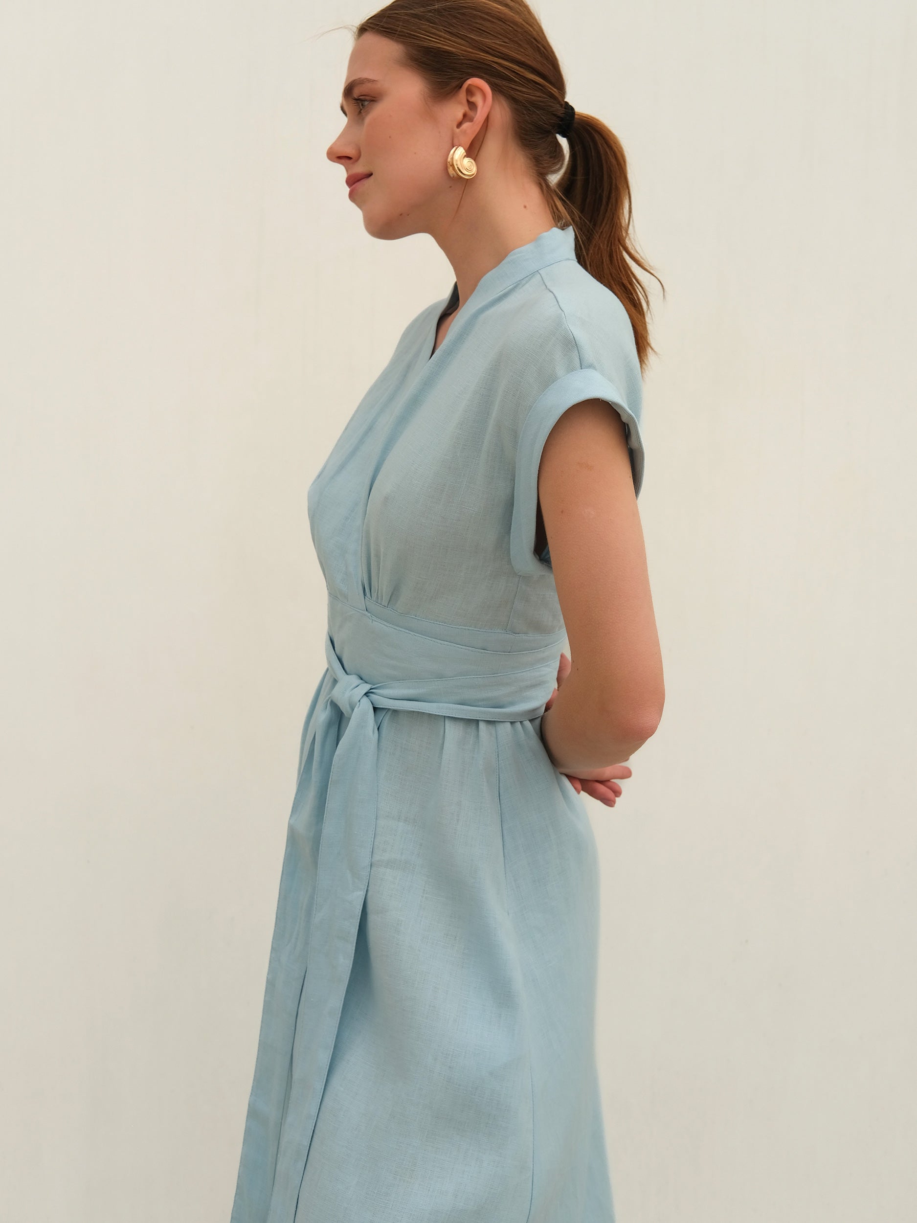 light blue dress with belt Women's Outfit: Light Blue Chiffon Party Dress, Silver Waist Belt, Beige Floral Bracelet